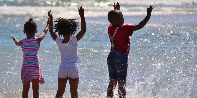 Kids Playing at the Beach