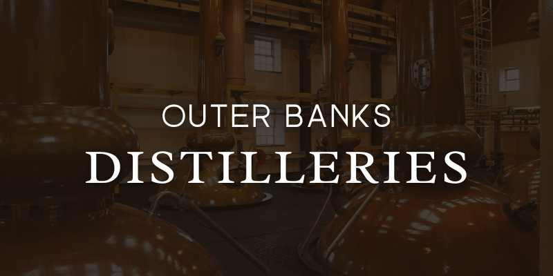 Distilleries to Explore on the Outer Banks Darkened background of distillery.